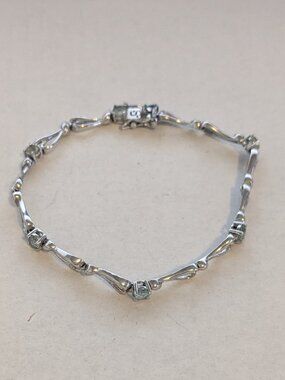 WM 925 Sterling Silver Faceted Pale Blue Stone Bracelet